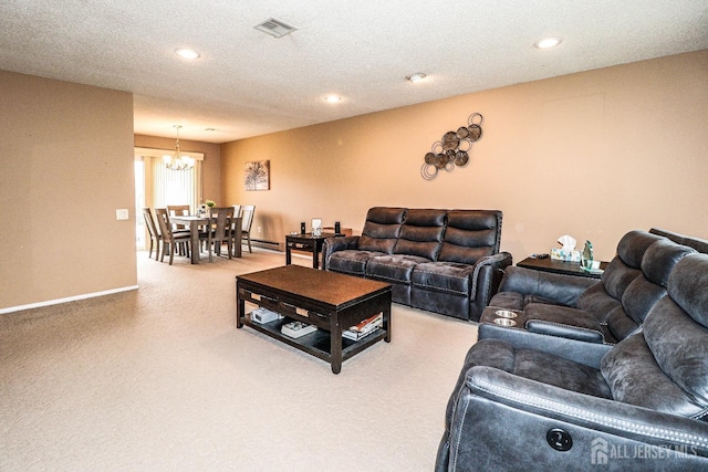 living area featuring carpet floors, recessed lighting, visible vents, an inviting chandelier, and a textured ceiling