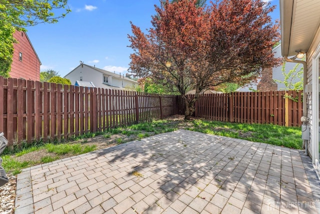 view of patio with a fenced backyard