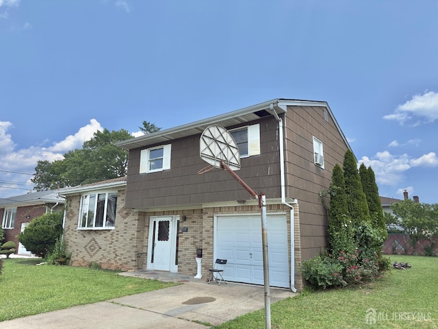 10 Van Buren Ave, Carteret, NJ 07008 - split level home with a garage, a front yard, brick siding, and driveway