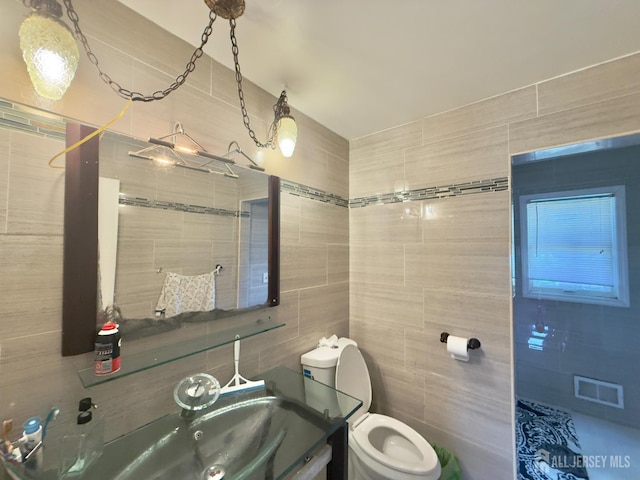 10 Van Buren Ave, Carteret, NJ 07008 - bathroom with tile walls and vanity