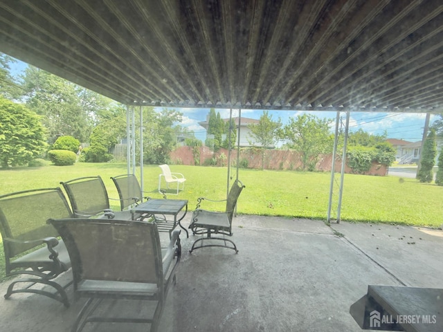 10 Van Buren Ave, Carteret, NJ 07008 - fenced backyard with outdoor dining area and a patio area