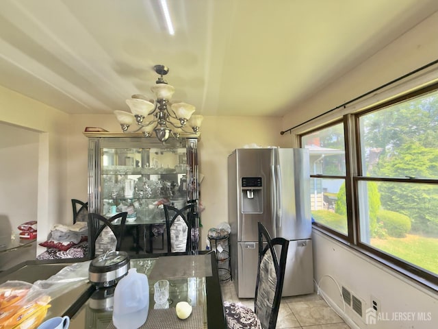 10 Van Buren Ave, Carteret, NJ 07008 - dining space featuring a chandelier and light tile patterned floors