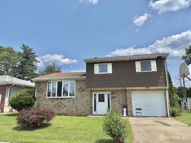10 Van Buren Ave, Carteret, NJ 07008 - split level home with brick siding, concrete driveway, a garage, and a front yard