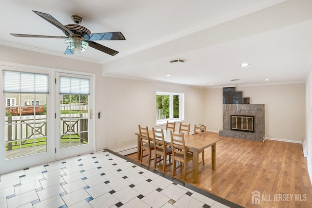 15 Meredith Rd, Edison, NJ 08817 - dining room featuring wood finished floors, baseboards, ornamental molding, a high end fireplace, and ceiling fan