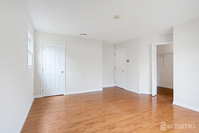 15 Meredith Rd, Edison, NJ 08817 - spare room with light wood-type flooring and baseboards