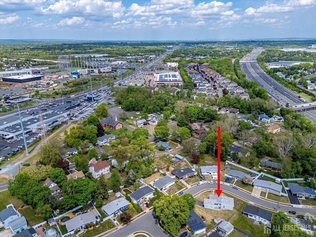 aerial view of property's location featuring a major roadway