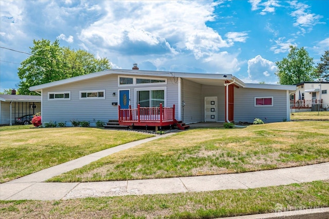 view of front of house with a deck
