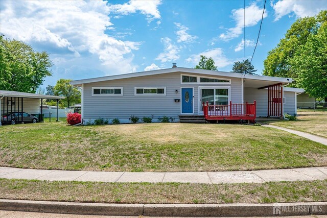 view of front of home with a wooden deck