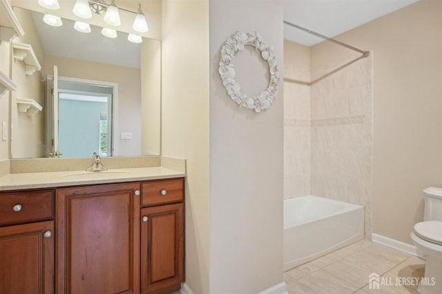 full bathroom featuring toilet, baseboards, shower / washtub combination, vanity, and tile patterned floors