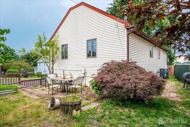 221 S Pine Ave S, South Amboy, NJ 08879 - rear view of property featuring outdoor dining area