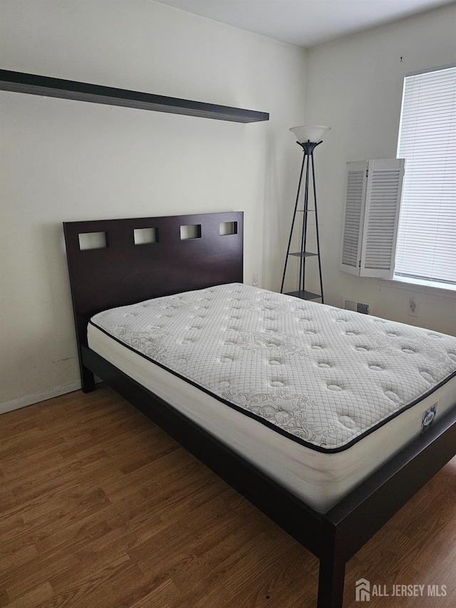 22 Victory Ct, Old Bridge, NJ 08857 - bedroom with wood finished floors and baseboards