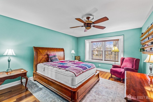 15 John Adams Ct, Monroe, NJ 08831 - bedroom with baseboards, wood finished floors, and a ceiling fan