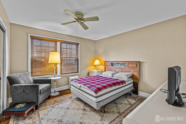 15 John Adams Ct, Monroe, NJ 08831 - bedroom with baseboards, wood finished floors, and a ceiling fan