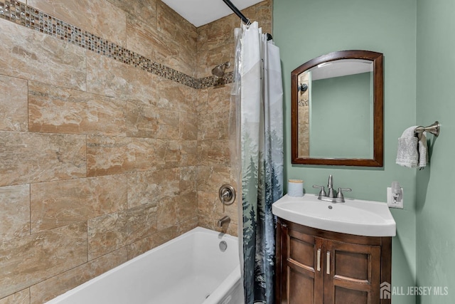 bathroom featuring vanity and shower / bath combo with shower curtain