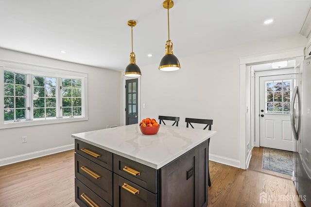 39 Embroidery St, Sayreville, NJ 08879 - kitchen featuring freestanding refrigerator, plenty of natural light, wood finished floors, and recessed lighting