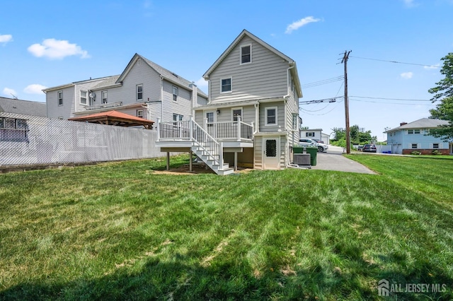 39 Embroidery St, Sayreville, NJ 08879 - back of property featuring stairs and a deck