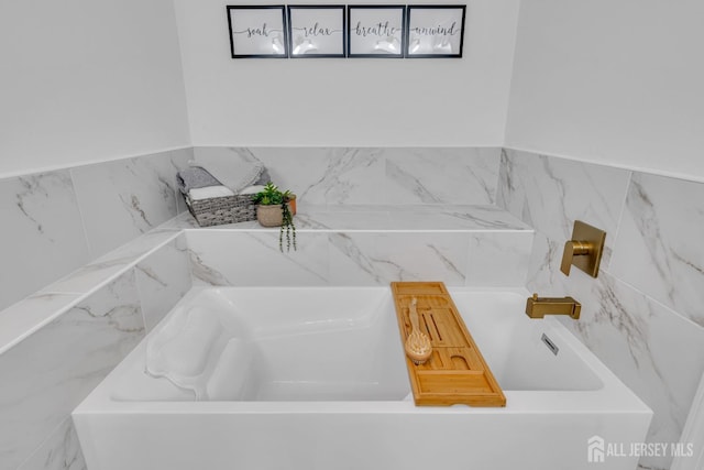 bathroom featuring a bathtub