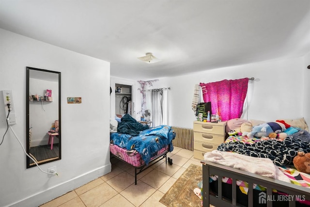 bedroom featuring tile patterned flooring