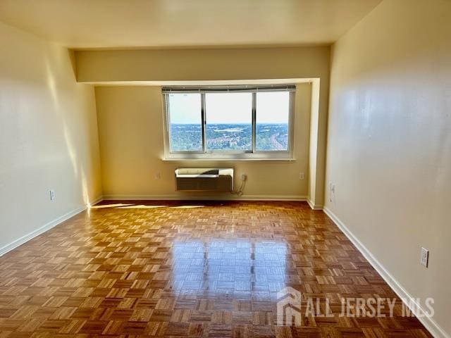 110 Somerset St Unit 2101, New Brunswick, NJ 08901 - empty room with a wall mounted air conditioner and baseboards