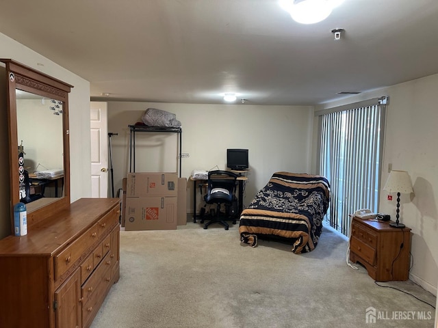 living area featuring light colored carpet