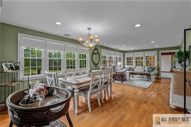 57 Patton Dr, East Brunswick, NJ 08816 - dining area with a chandelier, light wood-type flooring, and recessed lighting
