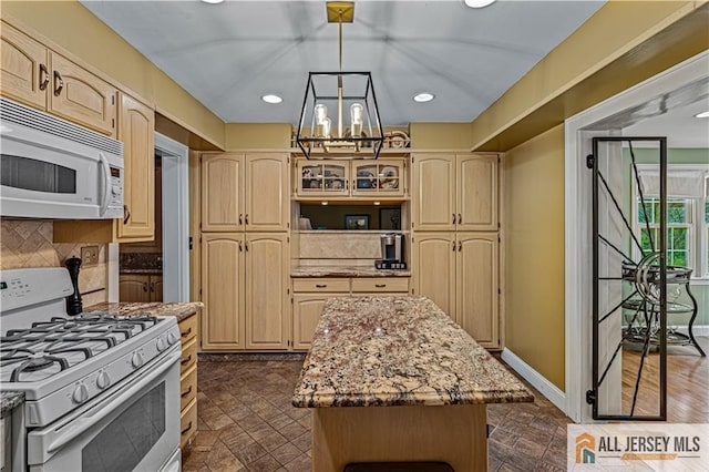 57 Patton Dr, East Brunswick, NJ 08816 - kitchen featuring white appliances, a chandelier, a kitchen island, recessed lighting, and decorative backsplash