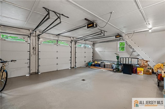 57 Patton Dr, East Brunswick, NJ 08816 - garage featuring a garage door opener