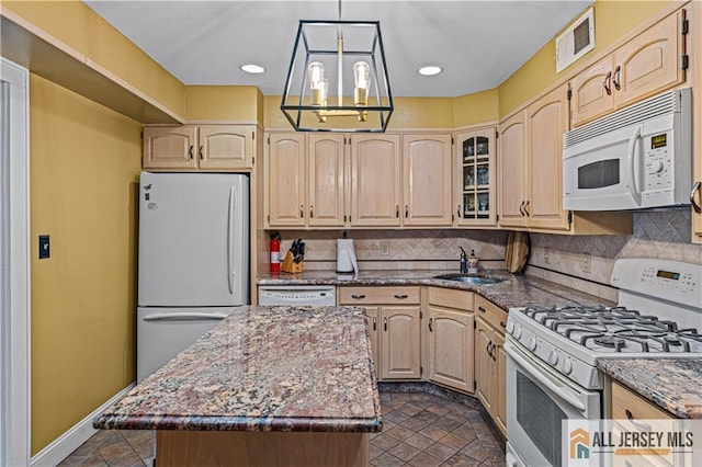 57 Patton Dr, East Brunswick, NJ 08816 - kitchen featuring white appliances, a sink, light brown cabinetry, decorative backsplash, and recessed lighting