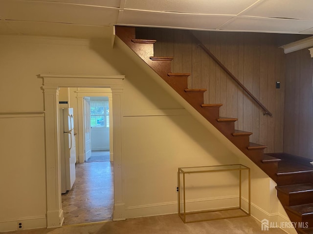 309 S 2nd Ave S, Highland Park, NJ 08904 - stairway with baseboards and wooden walls
