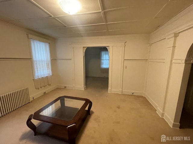 309 S 2nd Ave S, Highland Park, NJ 08904 - unfurnished bedroom featuring radiator, a closet, light colored carpet, and baseboards