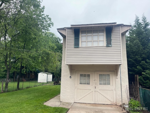 309 S 2nd Ave S, Highland Park, NJ 08904 - view of front of home with stucco siding