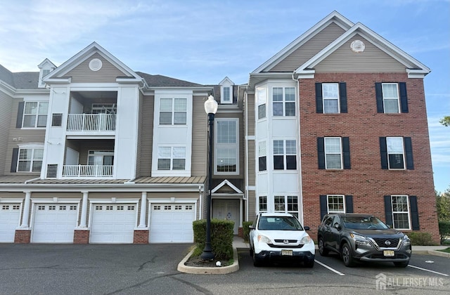 2116 Edward Stec Blvd, Edison, NJ 08837 - view of property with a standing seam roof and brick siding