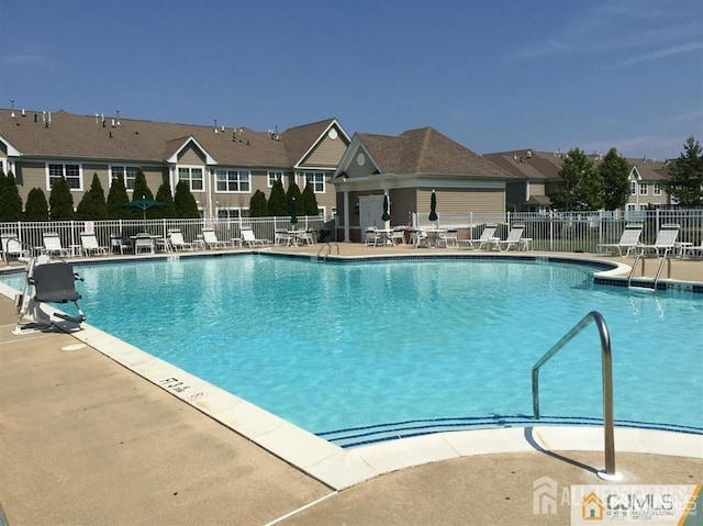 2116 Edward Stec Blvd, Edison, NJ 08837 - pool with a patio, fence, and a residential view