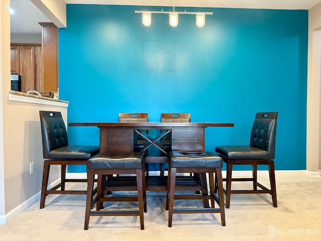 2116 Edward Stec Blvd, Edison, NJ 08837 - dining area with carpet flooring and baseboards