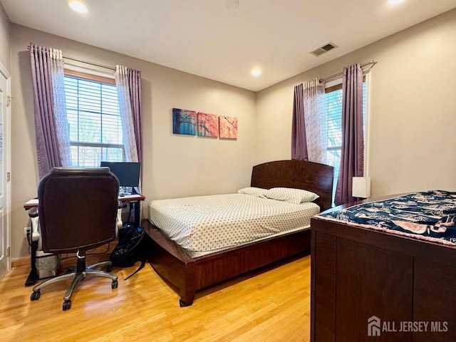2116 Edward Stec Blvd, Edison, NJ 08837 - bedroom featuring recessed lighting, visible vents, multiple windows, and light wood-style flooring
