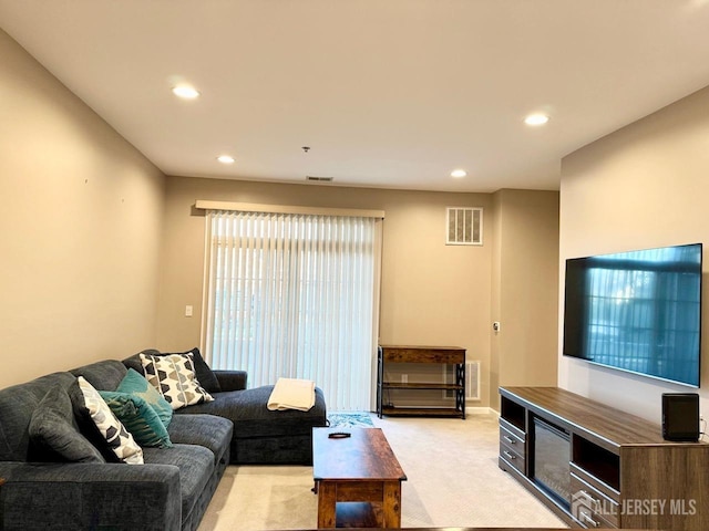 2116 Edward Stec Blvd, Edison, NJ 08837 - living room featuring visible vents, recessed lighting, and light carpet