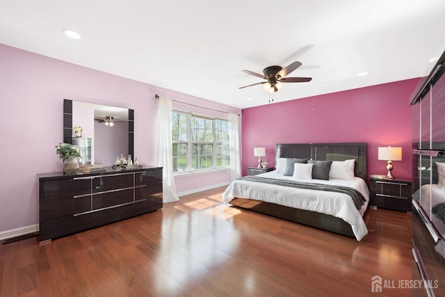 bedroom featuring baseboards, a ceiling fan, recessed lighting, and wood finished floors