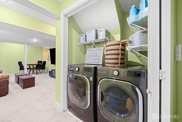 washroom featuring laundry area, carpet flooring, and washer and dryer