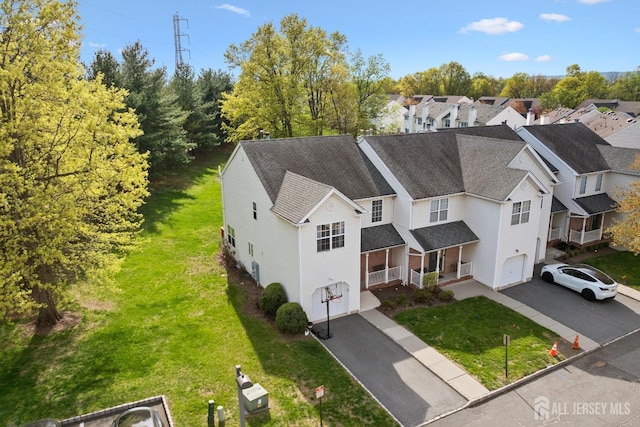 drone / aerial view with a residential view