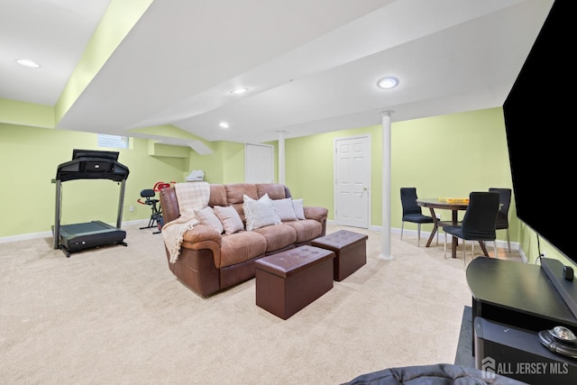 living area with recessed lighting, baseboards, and light carpet