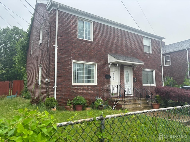 166 Fulton St, New Brunswick, NJ 08901 - view of front of house featuring brick siding