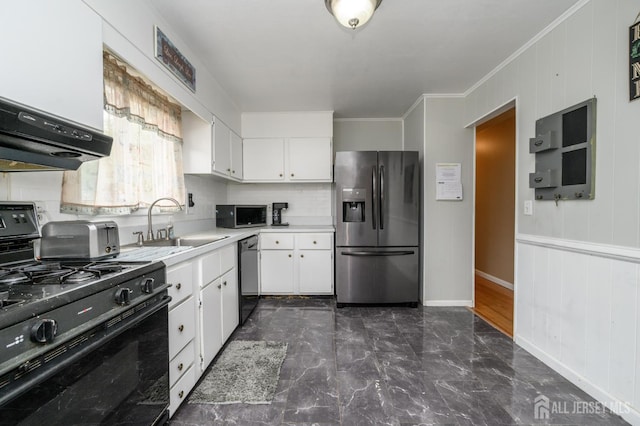 701 Beach Ave, Beachwood, NJ 08722 - kitchen with stainless steel appliances, light countertops, white cabinetry, dark marble finish flooring, and ornamental molding