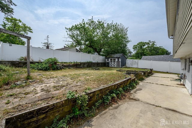701 Beach Ave, Beachwood, NJ 08722 - fenced backyard featuring a storage shed and a patio area