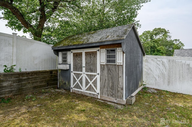 701 Beach Ave, Beachwood, NJ 08722 - view of shed with a fenced backyard