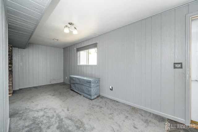 701 Beach Ave, Beachwood, NJ 08722 - basement with carpet and wood walls