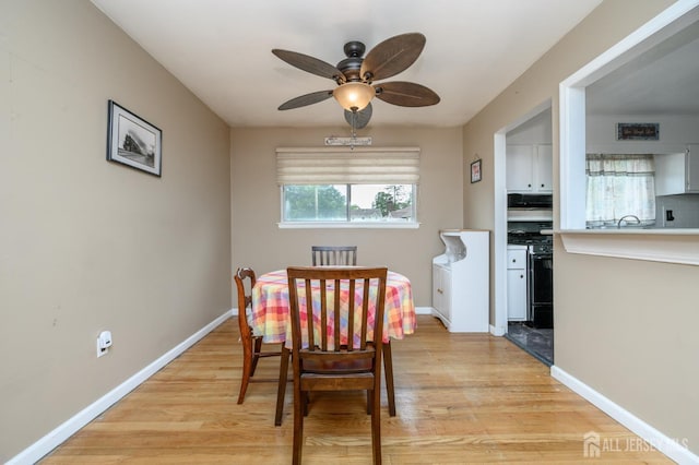 701 Beach Ave, Beachwood, NJ 08722 - dining space featuring a ceiling fan and light wood finished floors