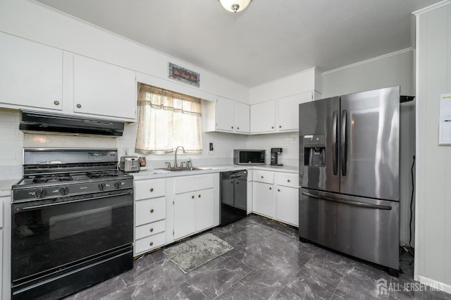 701 Beach Ave, Beachwood, NJ 08722 - kitchen featuring black appliances, under cabinet range hood, light countertops, dark marble finish flooring, and white cabinetry