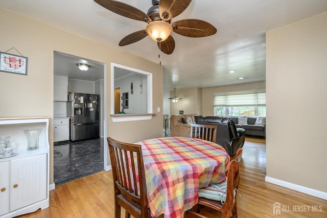 701 Beach Ave, Beachwood, NJ 08722 - dining room featuring light wood-type flooring and ceiling fan
