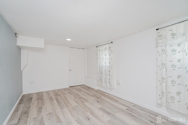 61 Trinity Ln, Woodbridge Proper, NJ 07095 - empty room with light wood-type flooring and recessed lighting