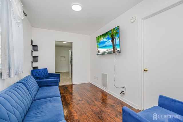 61 Trinity Ln, Woodbridge Proper, NJ 07095 - living room featuring wood finished floors and baseboards